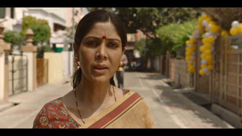 From the Netflix series "Mai: A Mother's Rage", a woman staring at something.